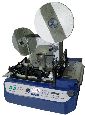 Photo of the Rena T-950 In-Line Tabber - Wafer Sealer that fits on a desktop
